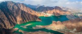 Hatta Lake and dam in United Arab Emirates (Image: Adobe Stock)