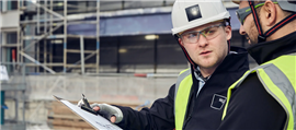 ISG workers in hi-vis jackets and hard hats